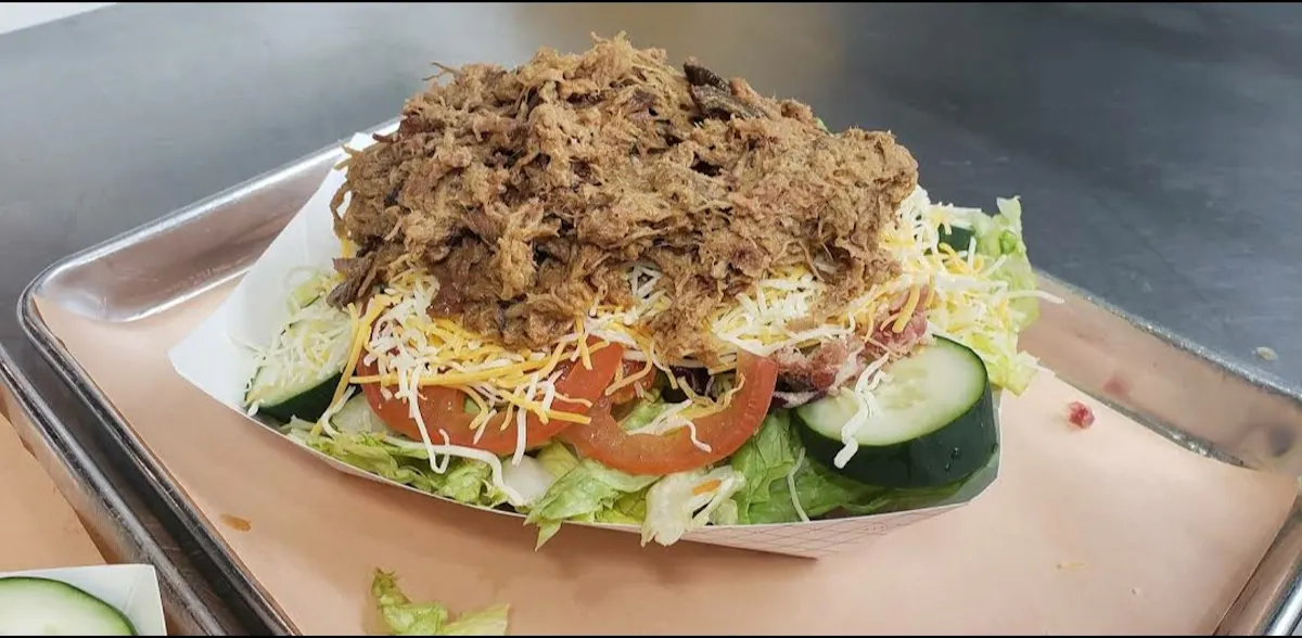a sandwich sitting on top of a plate of food